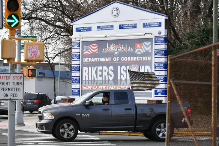 rikers sign